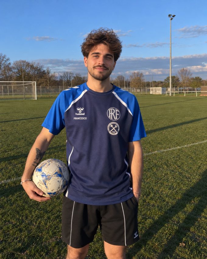 Francesco on the pitch, holding a ball